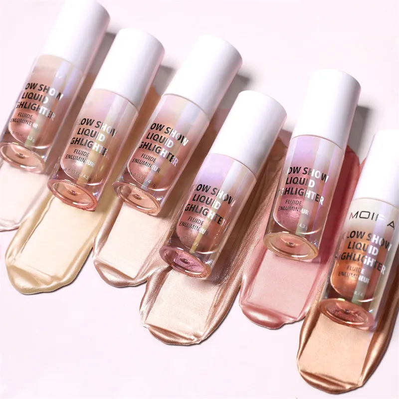 Six bottles of Glow Show Liquid Highlighter in various shades on a light surface.