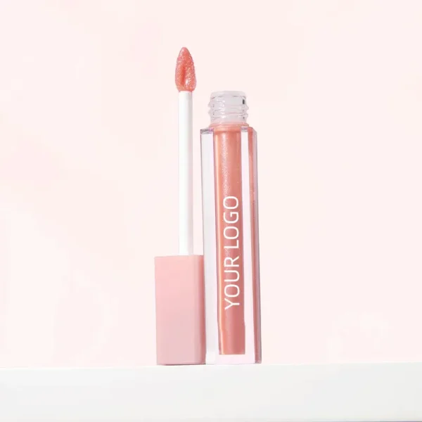 A lip gloss tube with the text 'YOUR LOGO' standing next to an applicator against a light background.