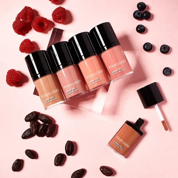 Five liquid blush bottles surrounded by raspberries, blueberries, and cocoa beans on a pink background.