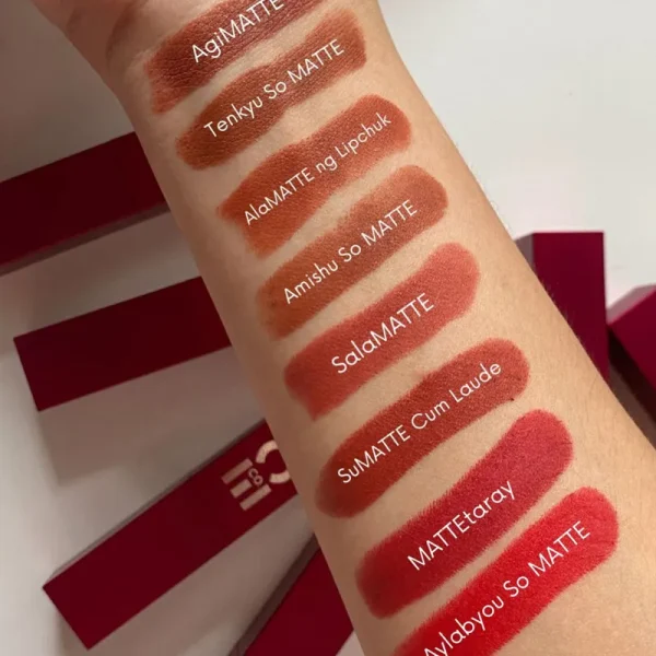 Arm showing swatches of various Tinted Lip Balm colors with humorous names.