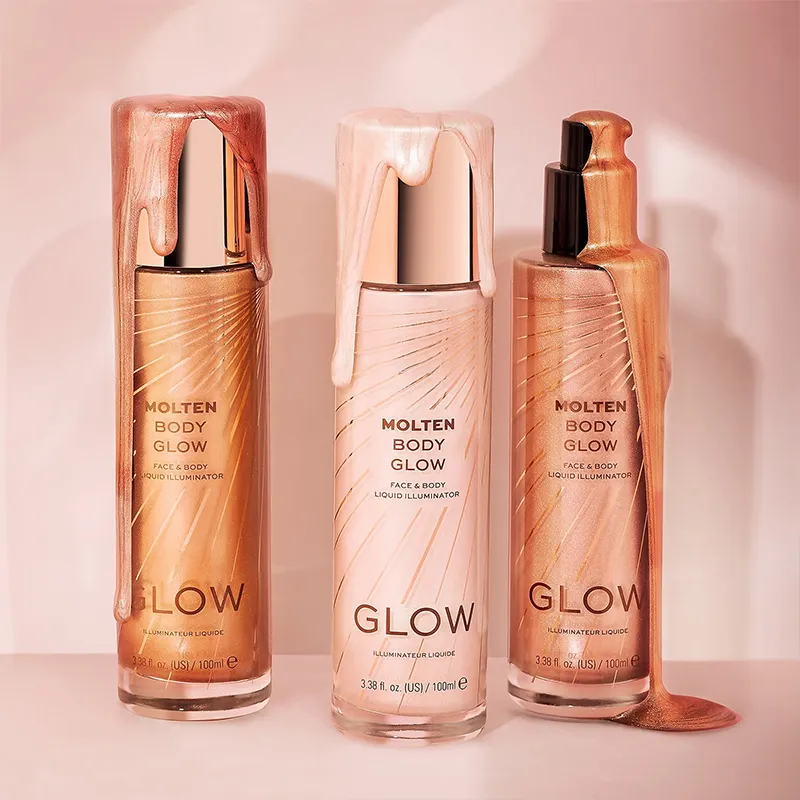 Three bottles of Molten Body Glow liquid illuminator in decorative design.