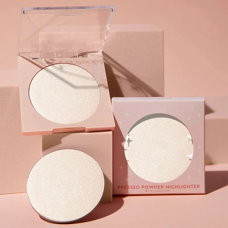 Pressed powder highlighter with packaging on a beige background.