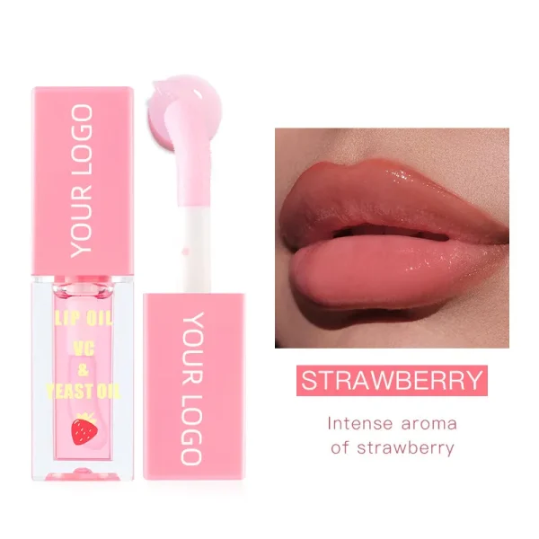 A pink tube of strawberry-scented lip oil with an applicator, next to a photo of glossy pink lips.