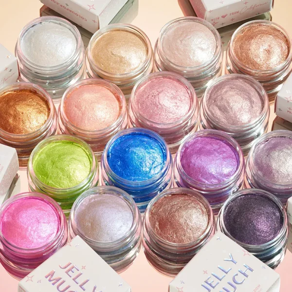 A collection of ColourPop Jelly Much eyeshadows in various shimmering colors displayed in open pots.