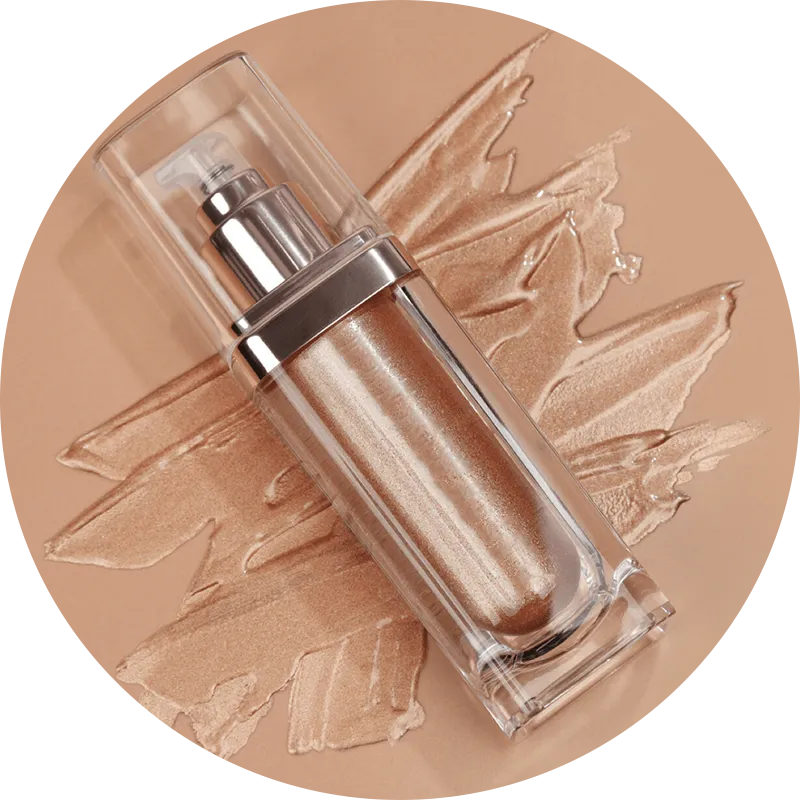 A bottle of liquid foundation with a pump dispenser against a smeared background.