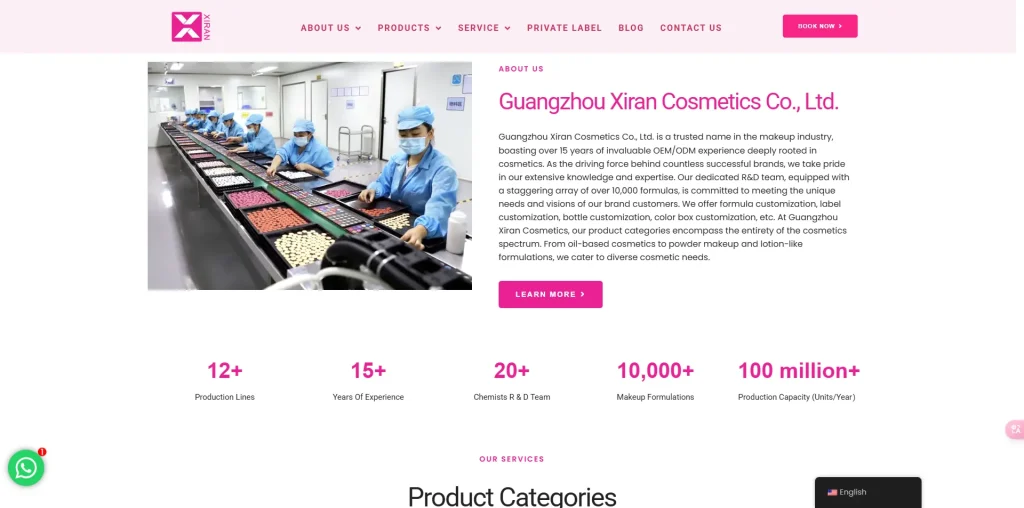 Factory workers in blue uniforms inspecting makeup products on a conveyor belt at Guangzhou Xiran Cosmetics Co., Ltd.