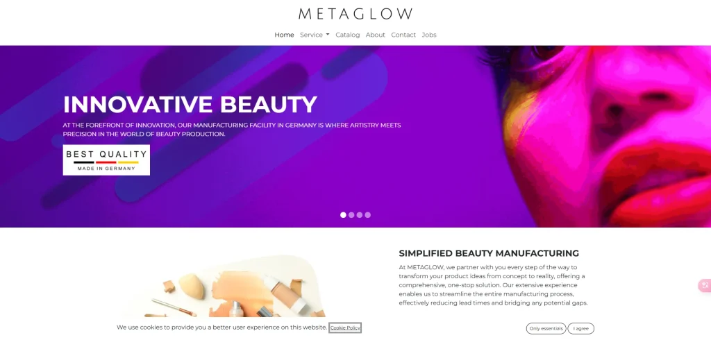 Website homepage of METAGLOW showcasing innovative beauty manufacturing and a vibrant facial image.