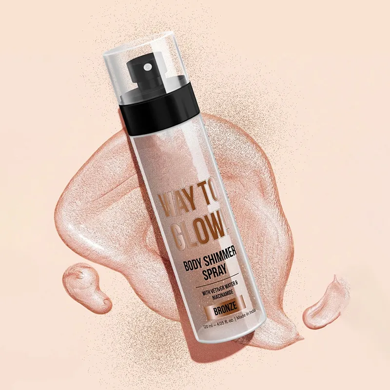 A bottle of Way To Glow Body Shimmer Spray with bronze shimmer background