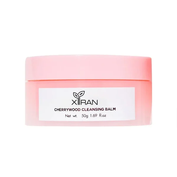 A pink container of Xiran Cherrywood Cleansing Balm with a label indicating net weight of 50g or 1.69 fl oz.