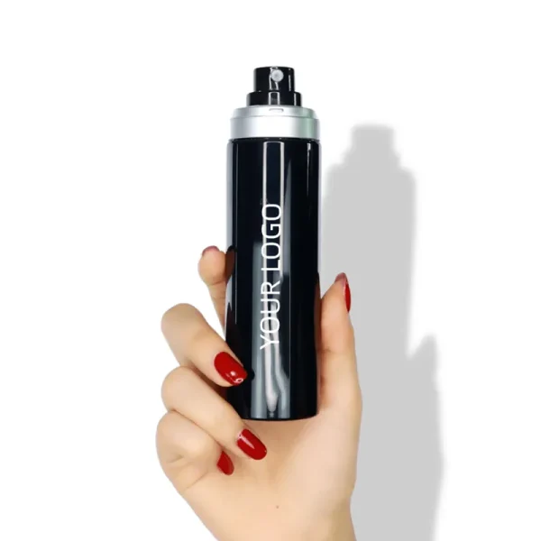 A hand with red nail polish holding a black bottle with a logo 'YOUR LOGO' against a white background.