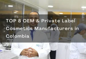 Person in lab coat in cosmetics manufacturing facility with text overlay about top cosmetics manufacturers in Colombia.