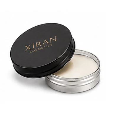 Small silver tin with a black lid featuring Xiran Cosmetics branding, containing a cream product.